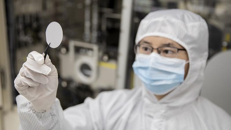 CEMSE EE Haiding Sun Holds Up A Gallium Oxide Template
